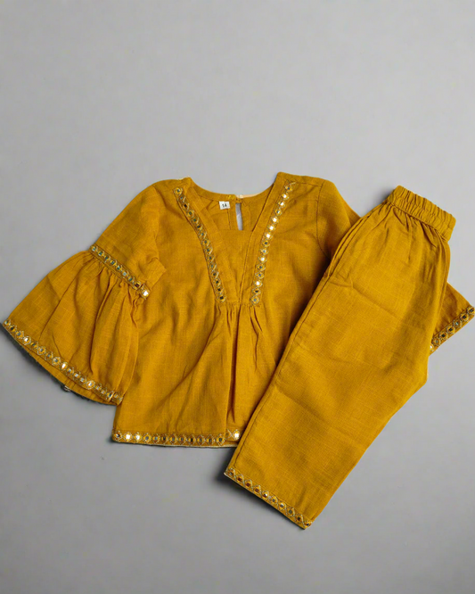Mustad Yellow Girl's Slub Cotton peplum styled top with elasticated Girls traditional wear