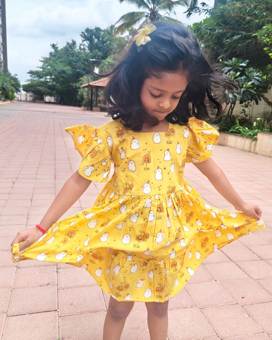 Girls Yellow Hand Block Printed Half Puffed Sleeve Frock Dress in pure cotton breathable fabric