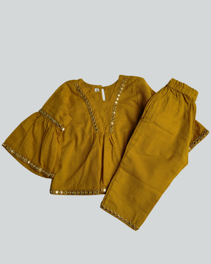 Mustad Yellow Girl's Slub Cotton peplum styled top with elasticated Girls traditional wear
