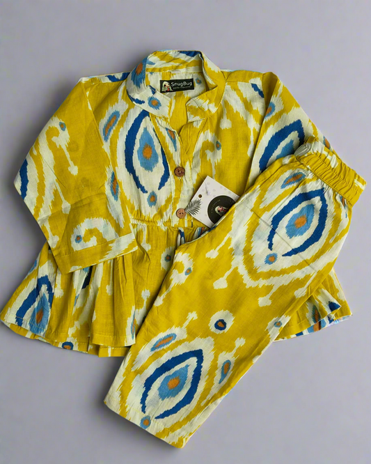 Pure cotton three fourth sleeve top with wooden buttons in front with a dori and a matching elasticated pant with 2 pockets