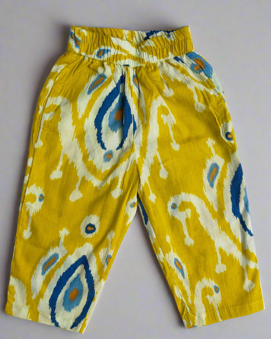 Pure cotton three fourth sleeve top with wooden buttons in front with a dori and a matching elasticated pant with 2 pockets