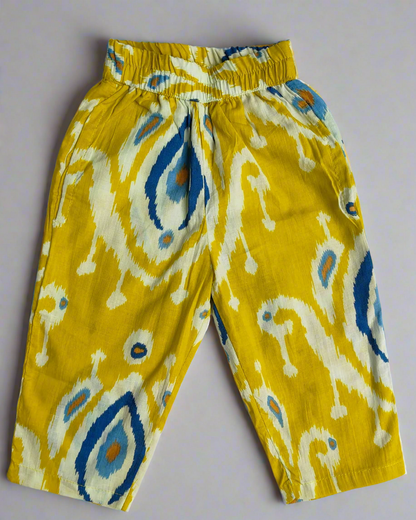 Pure cotton three fourth sleeve top with wooden buttons in front with a dori and a matching elasticated pant with 2 pockets