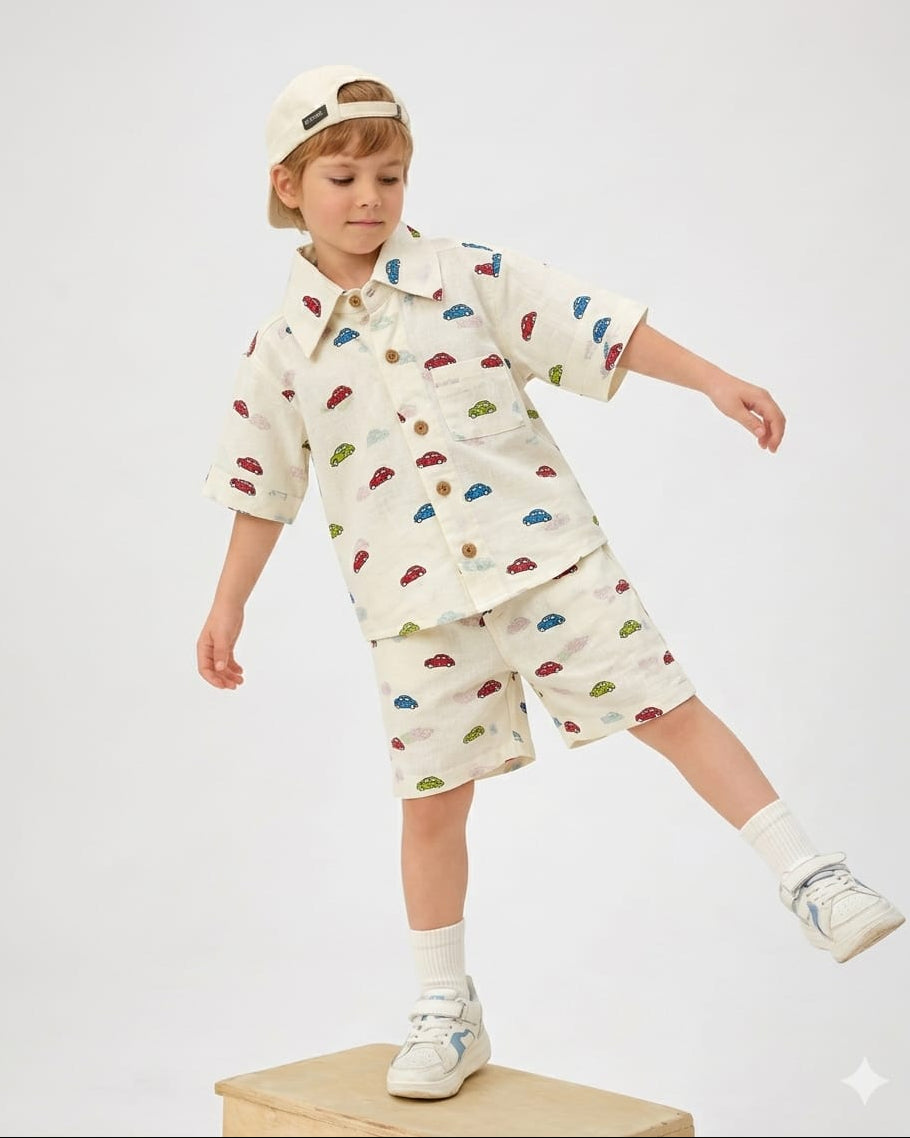 A boy wearing pure cotton car print white co-ord set
