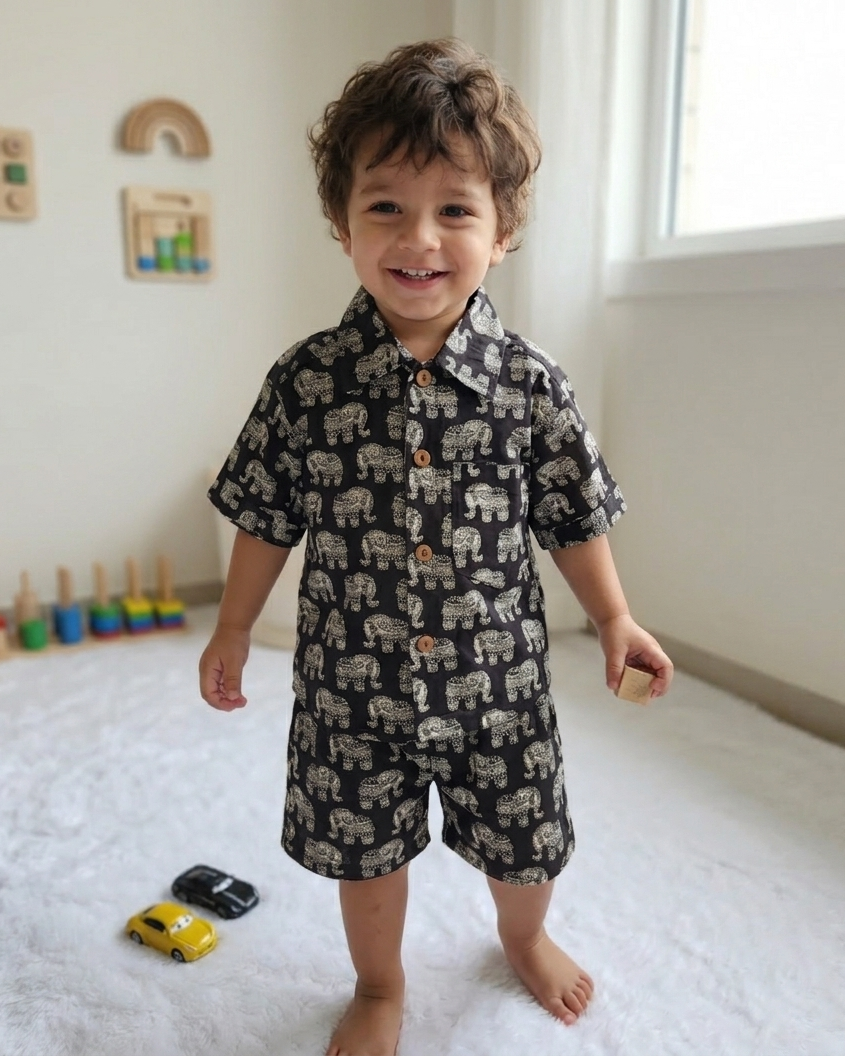 A tddler wearing SnugBug Elephant printed pure cotton shorts set